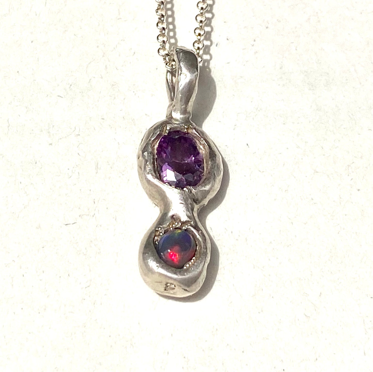 Purple CZ and Black Opal pendant in silver